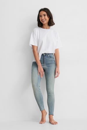 Washed Blue Skinny High Waist Raw Hem Jeans